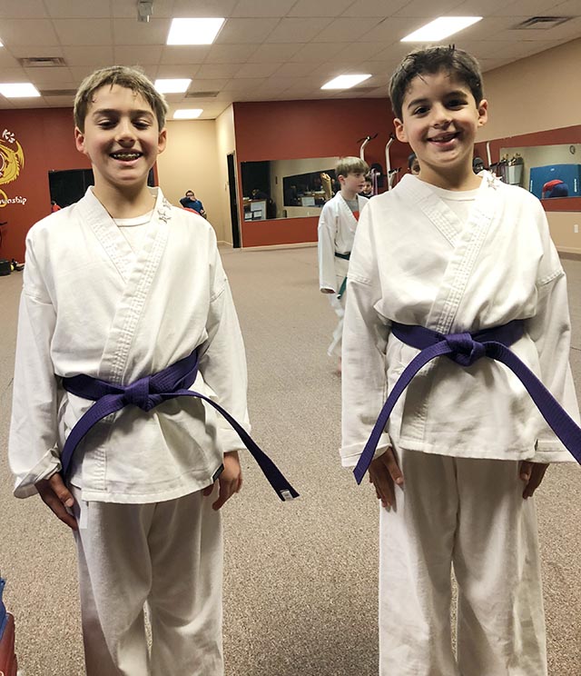 Anthony and Giuseppe Earn Martial Arts Purple Belts