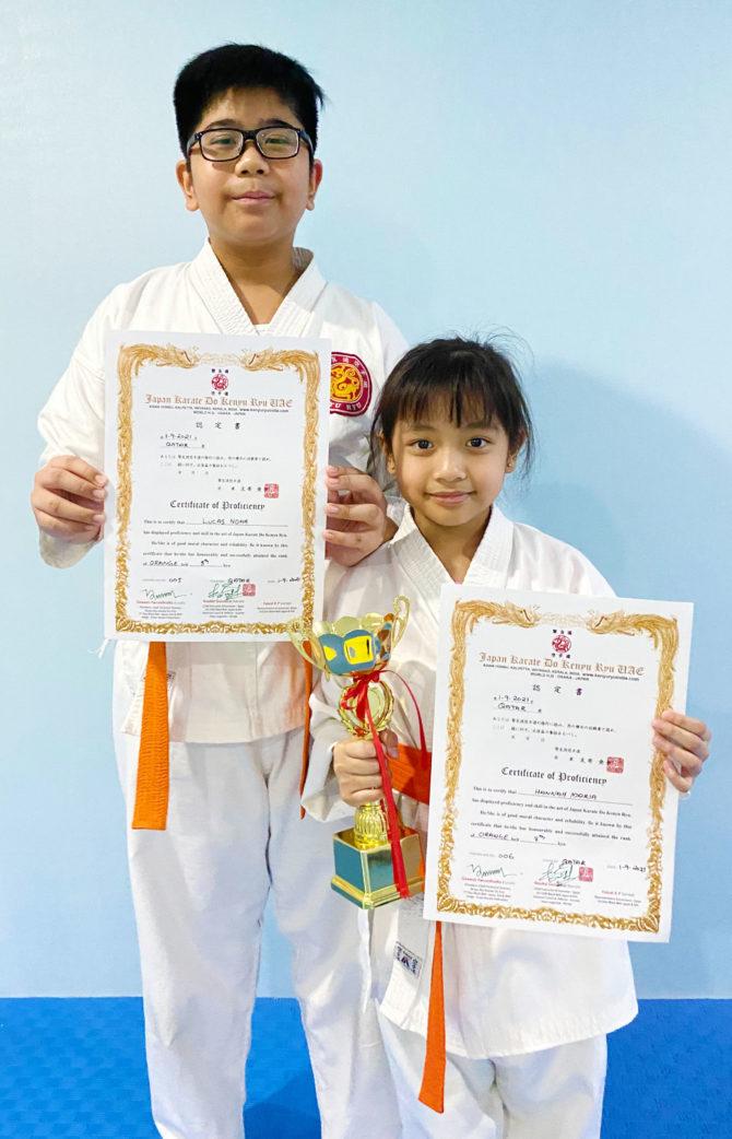 Lucas and Hanna Achieve Orange Belts in Karate